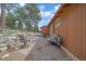 Spacious brick patio with outdoor seating and charming stone wall at 24699 Us Hwy 40, Golden, CO 80401