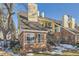 Brick townhouse exterior with stairs and landscaping at 13791 E Lehigh Ave # A, Aurora, CO 80014