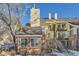 Brick townhouse exterior with stairs and landscaping at 13791 E Lehigh Ave # A, Aurora, CO 80014