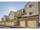 Townhouses with attached garages and brick facades at 13791 E Lehigh Ave # A, Aurora, CO 80014