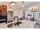 Contemporary kitchen with double sink and modern fixtures at 13791 E Lehigh Ave # A, Aurora, CO 80014