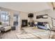 Living room with fireplace and hardwood floors at 13791 E Lehigh Ave # A, Aurora, CO 80014