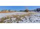 Community view showing homes and open space in winter at 4967 S Ukraine St, Aurora, CO 80015