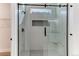 Modern shower with glass enclosure and stylish fixtures at 4967 S Ukraine St, Aurora, CO 80015