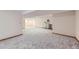 Finished basement area with neutral walls and carpet at 3743 W 103Rd Dr, Westminster, CO 80031