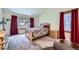 Bedroom with a bed, two windows, and warm-toned decor at 3743 W 103Rd Dr, Westminster, CO 80031
