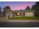 Charming single-Gathering home featuring a well-manicured lawn, brick accents, and a two-car garage at 3743 W 103Rd Dr, Westminster, CO 80031