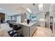 Modern kitchen featuring an island, stainless steel appliances, and skylights for natural light at 3743 W 103Rd Dr, Westminster, CO 80031