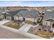 Charming single-Gathering home featuring a two-car garage, manicured lawn, and inviting curb appeal at 7268 Greenwater Cir, Castle Rock, CO 80108