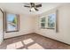 Bright bedroom with two windows allowing for plenty of natural light at 13486 Clayton St, Thornton, CO 80241