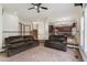 Cozy living area open to the kitchen and stairway at 13486 Clayton St, Thornton, CO 80241