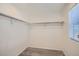 Large walk-in closet with double hanging rods at 16630 E Virginia Ave, Aurora, CO 80017