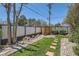Well-maintained backyard with stone accents, lush lawn, and storage shed for outdoor convenience at 1701 Kingston St, Aurora, CO 80010
