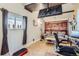 Relaxing bonus room with comfortable seating and a mounted TV at 1701 Kingston St, Aurora, CO 80010