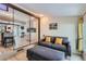 Inviting living room featuring a comfortable sofa, natural light, and stylish decor at 1701 Kingston St, Aurora, CO 80010