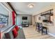 Bright living room with a modern sofa, hardwood floors, and a view to the outside at 1701 Kingston St, Aurora, CO 80010