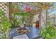 Inviting outdoor retreat with vine-covered pergola and grill at 1701 Kingston St, Aurora, CO 80010