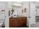 This bathroom features a vanity with drawers and a mirror at 1703 S Grant S St, Denver, CO 80210