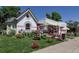 Charming storefront with colorful flowers and fresh cut flowers, adding to the neighborhood's appeal at 1703 S Grant S St, Denver, CO 80210