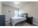 Simply decorated bedroom with neutral color palette, soft lighting and carpet at 21574 E 59Th Dr, Aurora, CO 80019