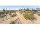 Neighborhood community garden with plots, flowers, and seating at 21574 E 59Th Dr, Aurora, CO 80019