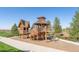 Neighborhood playground with a wooden play structure for  at 21574 E 59Th Dr, Aurora, CO 80019