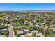 Overhead view of a lovely neighborhood with lush trees and well-kept homes at 2950 Wyecliff Ln, Highlands Ranch, CO 80126