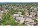 Scenic aerial view of a suburban neighborhood with well-maintained homes and mature trees at 2950 Wyecliff Ln, Highlands Ranch, CO 80126