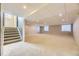 Finished basement offers lots of open space, recessed lighting, and carpet at 2950 Wyecliff Ln, Highlands Ranch, CO 80126