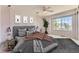 Bedroom with fan, a window with a view and grey color palate at 2950 Wyecliff Ln, Highlands Ranch, CO 80126