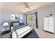 Bright bedroom with a large window, plush bedding, stylish decor, and a serene atmosphere for restful nights at 2950 Wyecliff Ln, Highlands Ranch, CO 80126