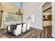 Dining area with chandelier and large window showing natural light at 2950 Wyecliff Ln, Highlands Ranch, CO 80126