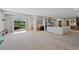Spacious basement featuring a walk-out patio, guitar corner, and relaxing living area at 12015 Blackwell Way, Parker, CO 80138