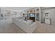 Large basement area with a long sofa and built-in shelves. Ideal for entertaining at 12015 Blackwell Way, Parker, CO 80138