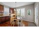 Cozy breakfast nook featuring a charming table setting and ample natural light from window at 12015 Blackwell Way, Parker, CO 80138