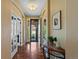 Inviting entryway featuring hardwood floors, elegant decor, and a welcoming atmosphere for guests and residents at 12015 Blackwell Way, Parker, CO 80138