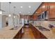 Modern kitchen featuring stainless steel appliances, a gas range, and generous counter space at 12015 Blackwell Way, Parker, CO 80138