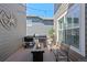 Cozy outdoor patio featuring a fire pit, grill, and comfortable seating, perfect for entertaining and relaxation at 12015 Blackwell Way, Parker, CO 80138