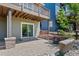 Enjoy a private outdoor patio with brick features and sliding glass door access at 12015 Blackwell Way, Parker, CO 80138