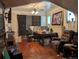 The living room features hardwood floors, a fireplace, and abundant natural light at 1415 Raleigh St, Denver, CO 80204