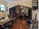 The open living room features hardwood floors and arched doorways at 1415 Raleigh St, Denver, CO 80204