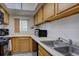 Well-lit kitchen offering ample counter space and modern appliances for a convenient cooking experience at 11115 E Alameda Ave # 201, Aurora, CO 80012
