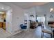 Bright living room showcasing the open layout, fireplace, and access to the balcony at 11115 E Alameda Ave # 201, Aurora, CO 80012