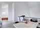 Bright loft features light wood floors, exercise equipment, and a view to the bath and soaking tub at 11115 E Alameda Ave # 201, Aurora, CO 80012