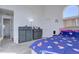 Comfortable bedroom with vaulted ceilings and ample natural light, creating a relaxing retreat at 11115 E Alameda Ave # 201, Aurora, CO 80012