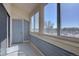 Enclosed porch with sliding glass doors and windows at 11115 E Alameda Ave # 201, Aurora, CO 80012