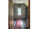 Bright and airy attic space boasting a large window, hardwood floors, and ample storage at 36 N Logan St, Denver, CO 80203