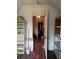 Versatile attic space featuring hardwood floors, shelving, and lots of natural light at 36 N Logan St, Denver, CO 80203