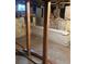Unfinished basement with brick walls and small window at 36 N Logan St, Denver, CO 80203
