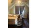 Cozy bedroom featuring a window with natural light at 36 N Logan St, Denver, CO 80203